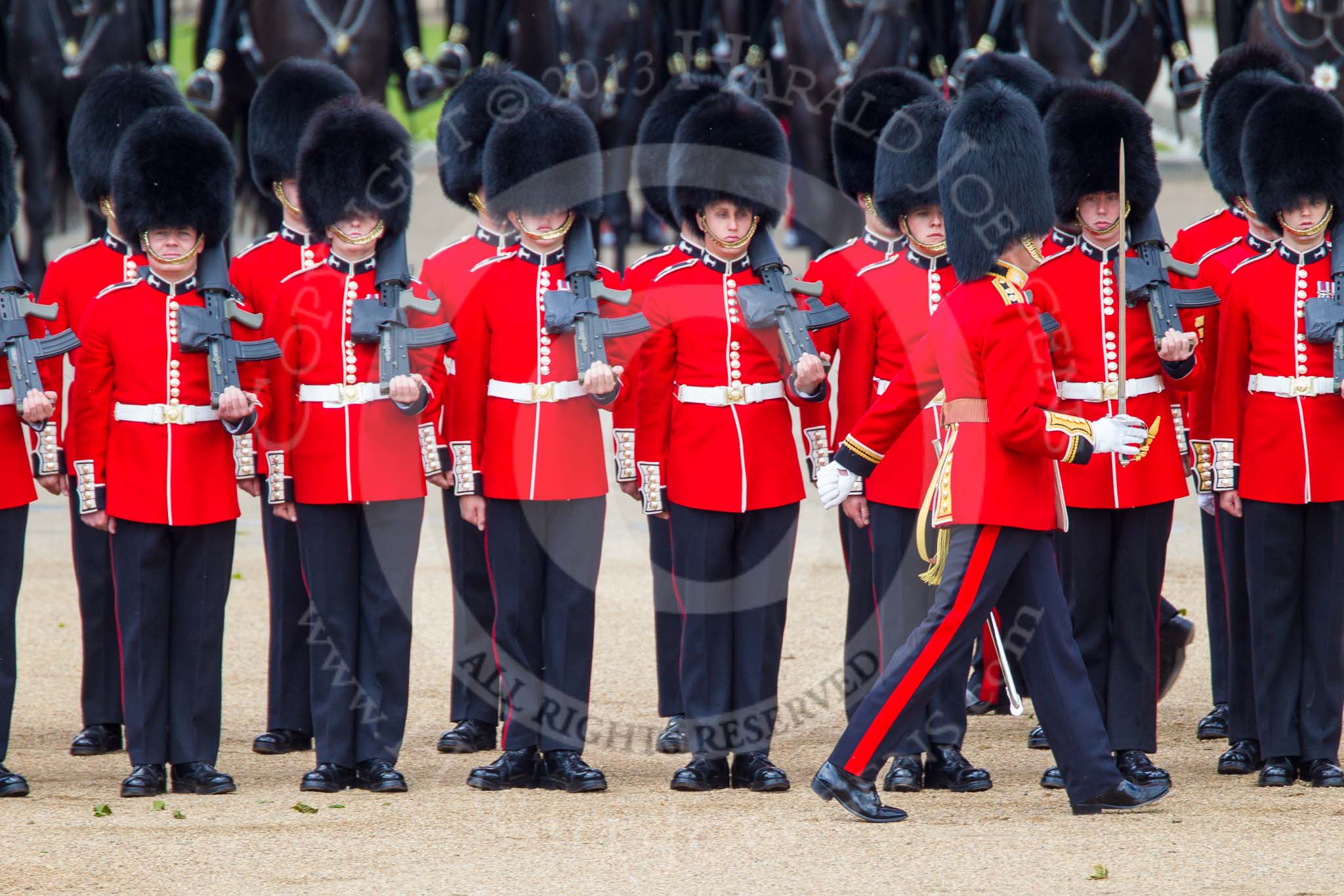 Trooping the Colour 2013: The officers are moving to the rear of the line of guardsmen for the March Past. Image #511, 15 June 2013 11:29 Horse Guards Parade, London, UK