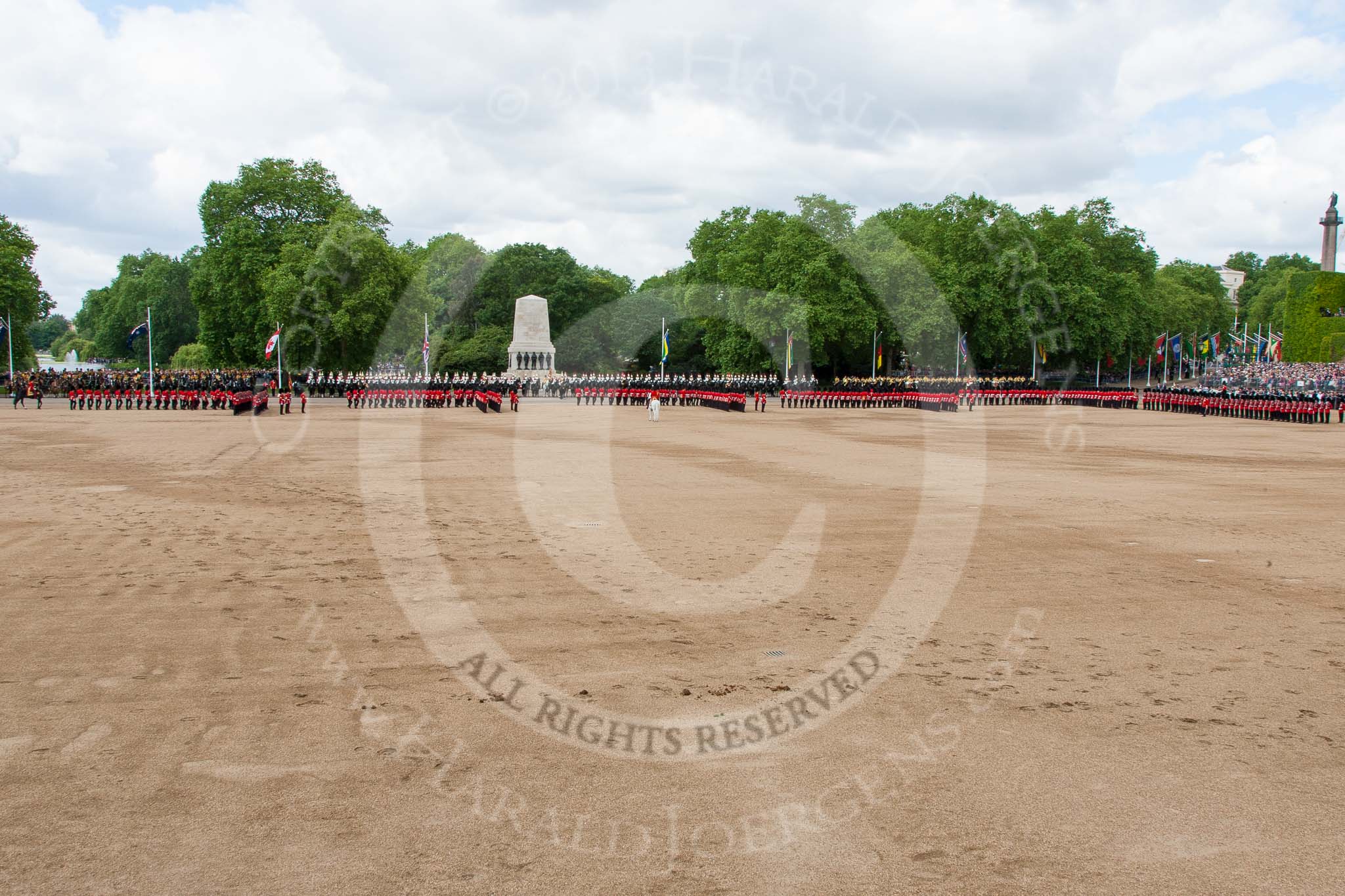 Trooping the Colour 2013: Wide angle overview of Horse Guards Parade before the March Past - the line of guardsmen changes back into review formation. Image #516, 15 June 2013 11:30 Horse Guards Parade, London, UK