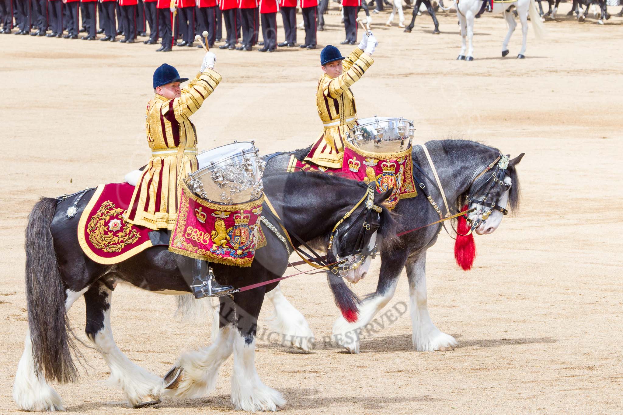 Trooping the Colour 2013: The two kettle drummers, saluting Her Majesty, as the Mounted Bands are about to march off. Image #748, 15 June 2013 12:00 Horse Guards Parade, London, UK