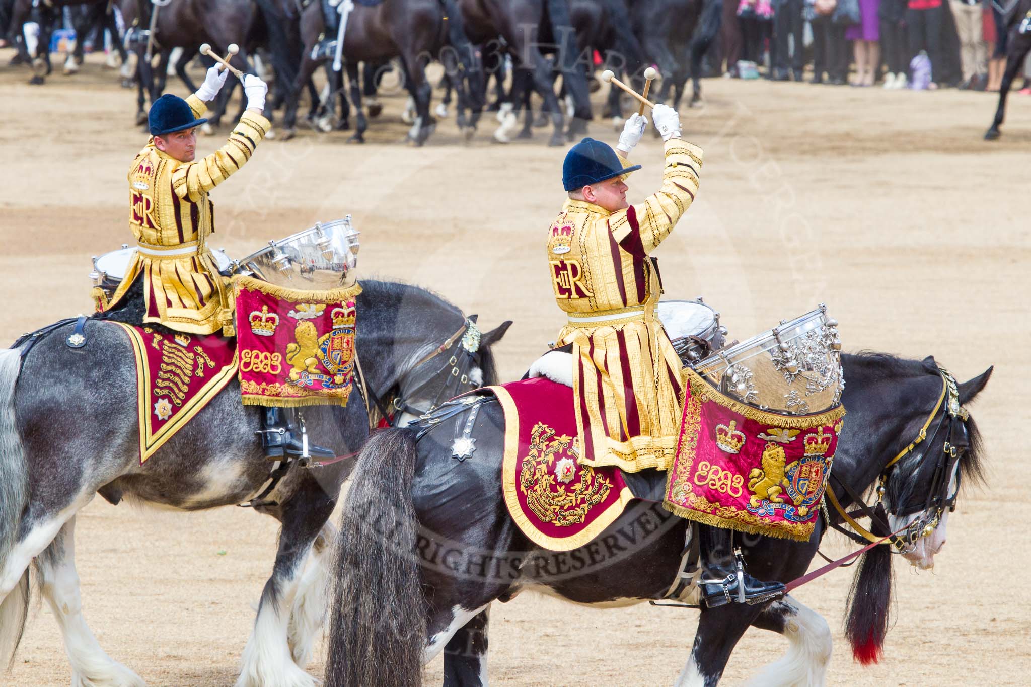 Trooping the Colour 2013: The two kettle drummers, saluting Her Majesty, as the Mounted Bands are about to march off. Image #750, 15 June 2013 12:00 Horse Guards Parade, London, UK