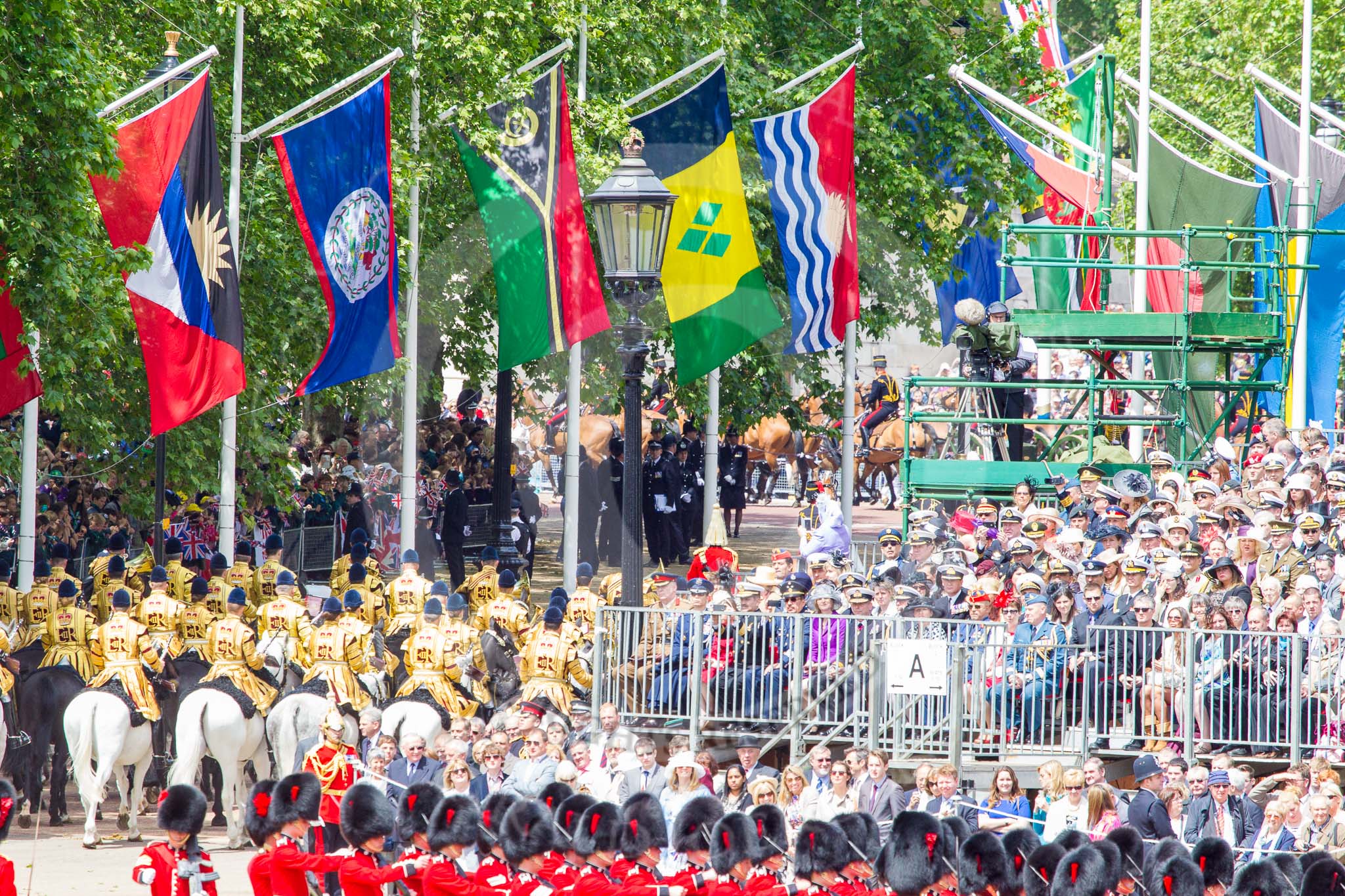 Trooping the Colour 2013: The King's Troop Royal Horse Artillery are marching off, some horses can be seen on The Mall. Image #767, 15 June 2013 12:04 Horse Guards Parade, London, UK