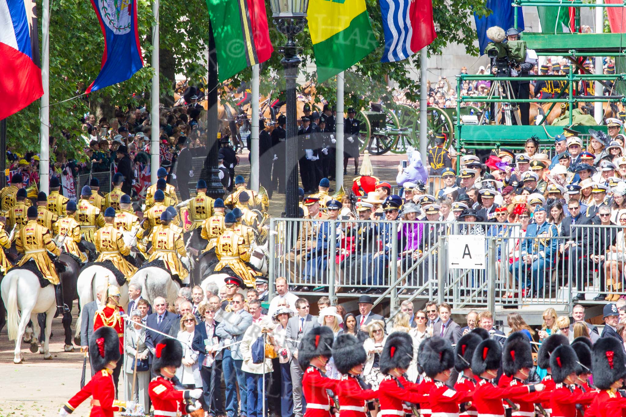 Trooping the Colour 2013: The King's Troop Royal Horse Artillery are marching off, some horses and guns can be seen on The Mall. Image #768, 15 June 2013 12:04 Horse Guards Parade, London, UK