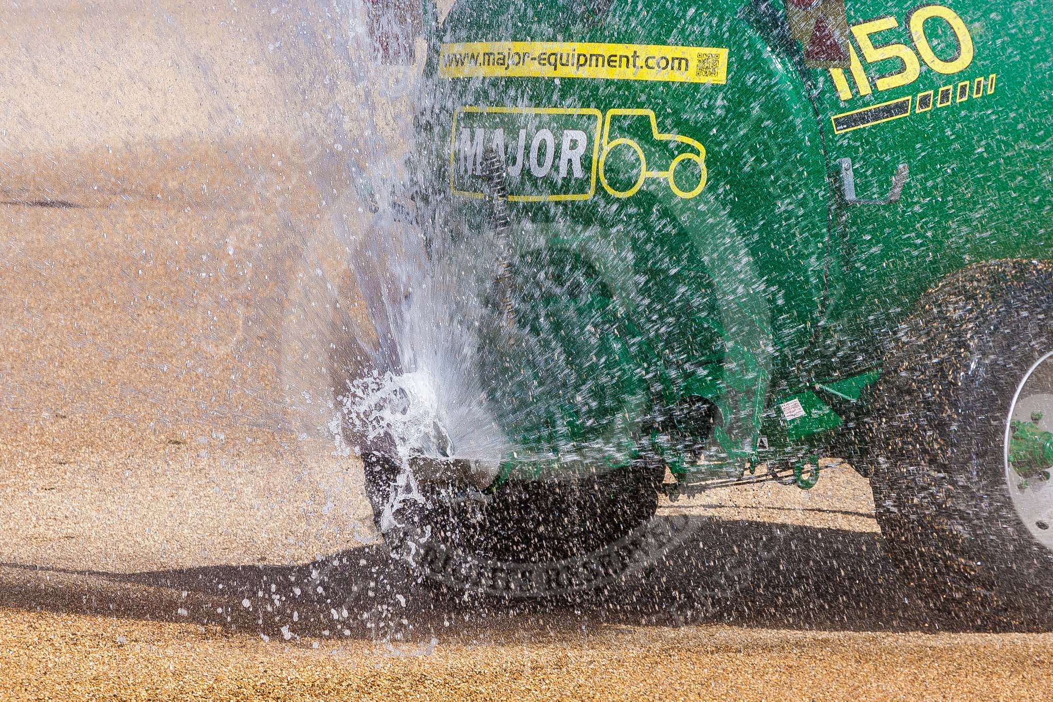 Horse Guards Parade before the event: The dry and dusty ground is watered and levelled in preparation for the parade.