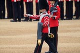 Duty Drummer Sam Orchard marching off with the Colour case, behind him Colour Sentry Guardsman Jonathon Hughes (26), during The Colonel's Review 2018 (final rehearsal for Trooping the Colour, The Queen's Birthday Parade)  at Horse Guards Parade, Westminster, London, 2 June 2018, 10:34.