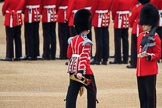 Duty Drummer Sam Orchard marching off with the Colour case, behind him Colour Sentry Guardsman Jonathon Hughes (26), during The Colonel's Review 2018 (final rehearsal for Trooping the Colour, The Queen's Birthday Parade)  at Horse Guards Parade, Westminster, London, 2 June 2018, 10:34.