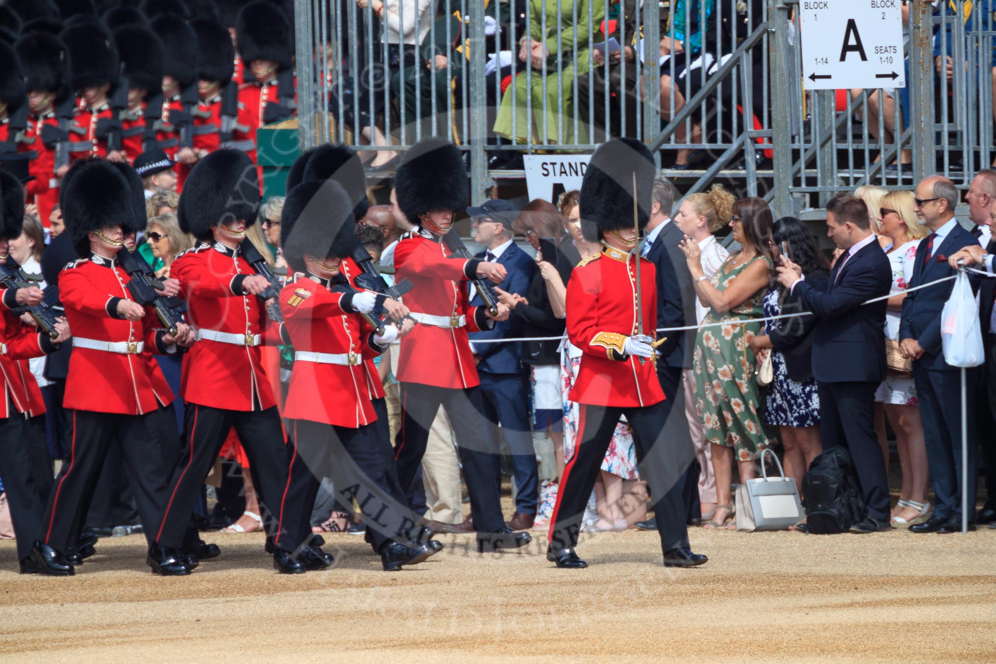 Number Six Guard, F Company, Scots Guards, led by The Subaltern, Captain William Dalton Hall (27),  arrives first on Horse Guards Parade during Trooping the Colour 2018, The Queen's Birthday Parade at Horse Guards Parade, Westminster, London, 9 June 2018, 10:25.