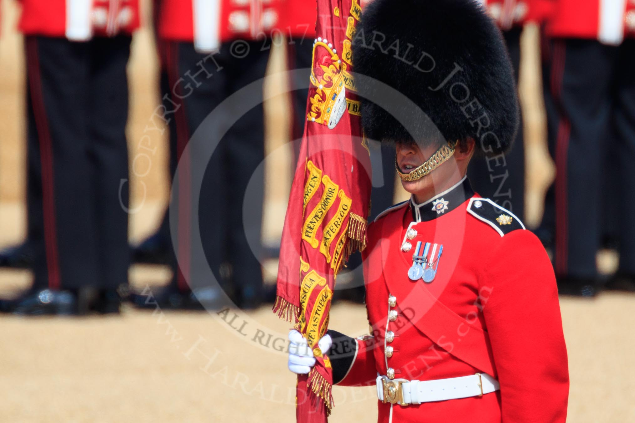 The Colour Sergeant Sam McAuley (31) holding the just uncased Colour during Trooping the Colour 2018, The Queen's Birthday Parade at Horse Guards Parade, Westminster, London, 9 June 2018, 10:33.