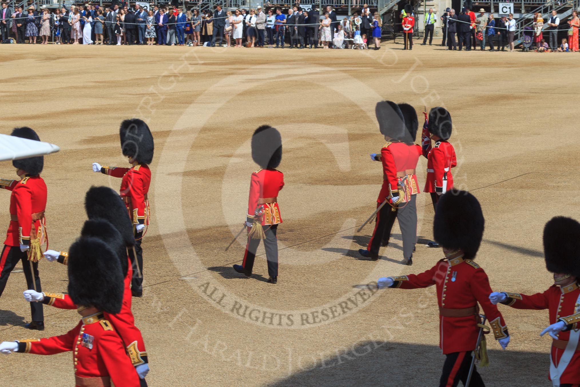 The 18 officers that had earlier marched through Horse Guards Arch are now marching back to their troops during Trooping the Colour 2018, The Queen's Birthday Parade at Horse Guards Parade, Westminster, London, 9 June 2018, 10:37.