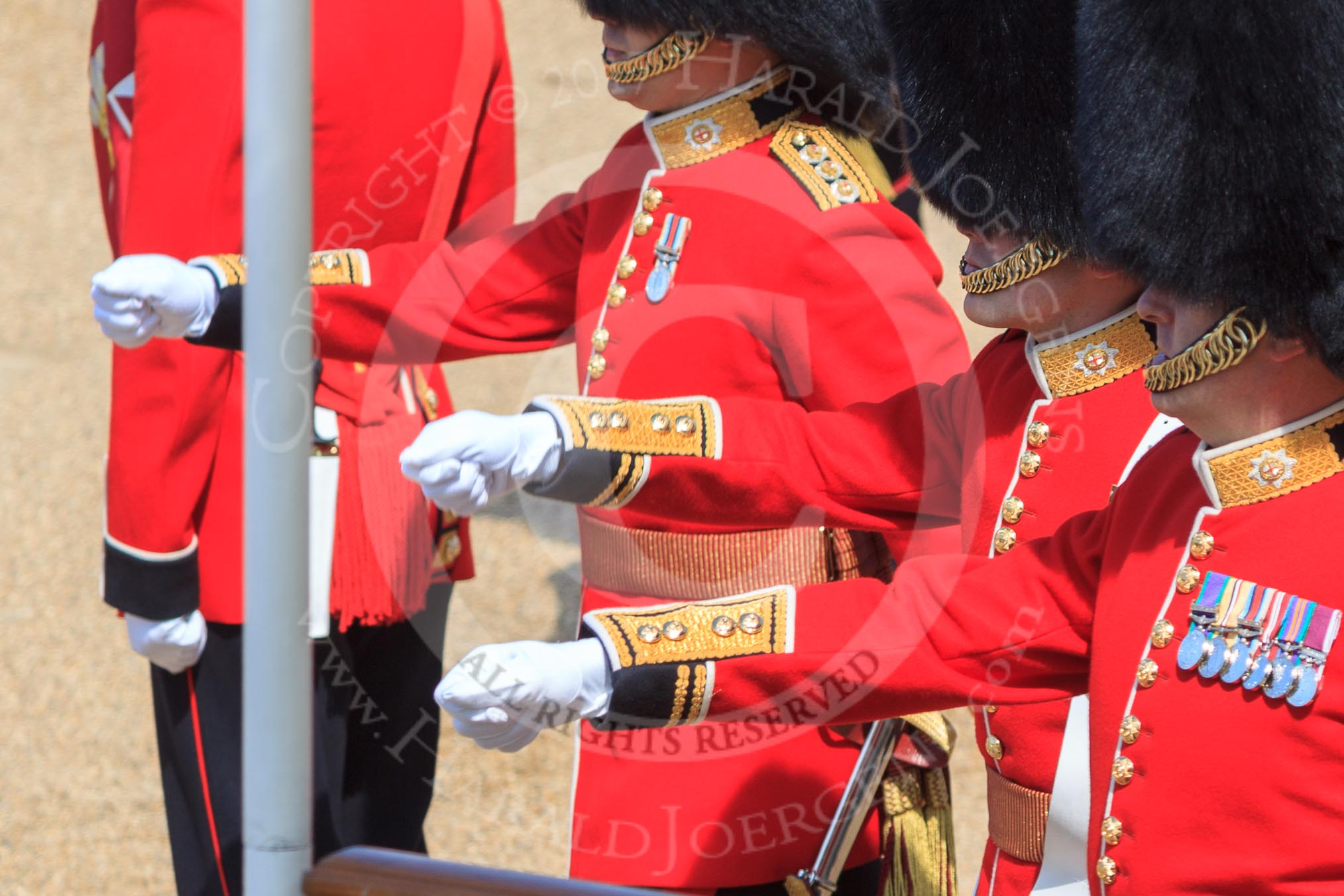 The Subaltern, Captain HCC Bucknall, The Ensign, 2nd Lieutenant J Boggis-Rolfe, and The Captain of the Guard, Major JW Coleby, all Escort to the Colour, 1st Battalion Coldstream Guards, marching from Horse Guards Arch to their guard during Trooping the Colour 2018, The Queen's Birthday Parade at Horse Guards Parade, Westminster, London, 9 June 2018, 10:37.