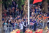 The crowded Youth Enclosure, with the Band of the Welsh Guards marching past, before Trooping the Colour 2018, The Queen's Birthday Parade at Horse Guards Parade, Westminster, London, 9 June 2018, 10:12.