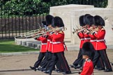 Musicians of the Band of the Irish Guards marching past the Guards Memorial during Trooping the Colour 2018, The Queen's Birthday Parade at Horse Guards Parade, Westminster, London, 9 June 2018, 10:28.