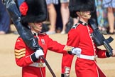 Colour Sergeant Sam McAuley (31) with the encased Colour, and Colour Sentry Guardsman Sean Cunningham (21) during Trooping the Colour 2018, The Queen's Birthday Parade at Horse Guards Parade, Westminster, London, 9 June 2018, 10:32.