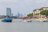 TOW River Thames Barge Driving Race 2013: Three barges abreast - from left "Darren Lacey", by Princess Pocahontas, "Spirit of Mountabatten", by Mechanical Movements and Enabling Services Ltd, and "Hoppy", by GPS Fabrication, approaching Masthouse Terrace Pier. In the background the skyscrapers in the City of London..
River Thames between Greenwich and Westminster,
London,

United Kingdom,
on 13 July 2013 at 12:41, image #173