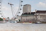 TOW River Thames Barge Driving Race 2013: Barge ""Shell Bay" by South Dock Marina, with the London Eye and London Aquarium behind, close to the finish of the race at Westminster Bridge..
River Thames between Greenwich and Westminster,
London,

United Kingdom,
on 13 July 2013 at 14:23, image #445