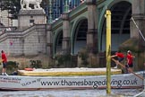 TOW River Thames Barge Driving Race 2013: Barge ""Shell Bay" by South Dock Marina,  crosses the finish of the race at Westminster Bridge..
River Thames between Greenwich and Westminster,
London,

United Kingdom,
on 13 July 2013 at 14:24, image #449