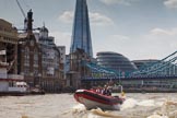 TOW River Thames Barge Driving Race 2013: RIB "Red Alert" passing Butler's Wharf, with  Tower Bridge, City Hall, and the "Shard" building behind..
River Thames between Greenwich and Westminster,
London,

United Kingdom,
on 13 July 2013 at 15:02, image #546