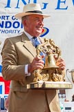 TOW River Thames Barge Driving Race 2013: Admiral Alan West holding the Transport on Water Challenge Trophy at the price-giving..
River Thames between Greenwich and Westminster,
London,

United Kingdom,
on 13 July 2013 at 16:28, image #580