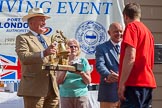 TOW River Thames Barge Driving Race 2013: Admiral Alan West handing over the Transport on Water Challenge Trophy, for the first overall winner, to the crew of barge "Blackwall", by the Port of London Authority..
River Thames between Greenwich and Westminster,
London,

United Kingdom,
on 13 July 2013 at 16:28, image #581