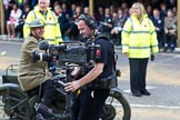 The Lord Mayor's Show 2011: BBC cameraman capturing the 1905 Renault, registration AA1, from the Automobile Association (http://www.theaa.com/)..
Opposite Mansion House, City of London,
London,
-,
United Kingdom,
on 12 November 2011 at 11:34, image #347