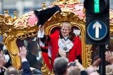 The Lord Mayor's Show 2011: The new Lord Mayor, David Wootton, waving from the golden state coach that is about to carry him to St Pauls Catherdral..
Opposite Mansion House, City of London,
London,
-,
United Kingdom,
on 12 November 2011 at 12:19, image #760