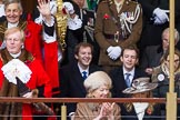 Lord Mayor's Show 2012: The outgoing Lord Mayor, David Wootton, the outgoing Lady Mayoress, Liz Wootton, Sophie Wootton, and James and Christopher Wootton behind..
Press stand opposite Mansion House, City of London,
London,
Greater London,
United Kingdom,
on 10 November 2012 at 11:19, image #622