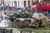 Lord Mayor's Show 2013: 73-The Royal Yeomanry- is London's only Army Reserve Calvary unit.  It use some of the armoured vehicles that you will see in the Show today..
Press stand opposite Mansion House, City of London,
London,
Greater London,
United Kingdom,
on 09 November 2013 at 11:41, image #887