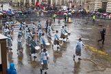 Lord Mayor's Show 2013: 81-Zunft Zur Zimmerleuten Band- the band traditionally supports the Zurich Swiss Gild of the Zimmerleuten in its parade and pageants, and is continuing that tradition today..
Press stand opposite Mansion House, City of London,
London,
Greater London,
United Kingdom,
on 09 November 2013 at 11:45, image #967