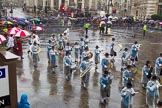 Lord Mayor's Show 2013: 81-Zunft Zur Zimmerleuten Band- the band traditionally supports the Zurich Swiss Gild of the Zimmerleuten in its parade and pageants, and is continuing that tradition today..
Press stand opposite Mansion House, City of London,
London,
Greater London,
United Kingdom,
on 09 November 2013 at 11:45, image #974