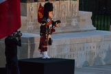 Beating Retreat 2014: The lone piper, playing "Lord Lovetts Lament" at the Guards Memorial - Lance Corporal James Bell, 1st Battalion Scots Guards, F Company Scots Guards' piper..
Horse Guards Parade, Westminster,
London SW1A,

United Kingdom,
on 11 June 2014 at 21:11, image #288