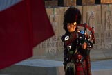 Beating Retreat 2014: The lone piper, playing "Lord Lovetts Lament" at the Guards Memorial - Lance Corporal James Bell, 1st Battalion Scots Guards, F Company Scots Guards' piper..
Horse Guards Parade, Westminster,
London SW1A,

United Kingdom,
on 11 June 2014 at 21:12, image #289