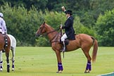 7th Heritage Polo Cup semi-finals: Umpire Gaston Devrient throwing in the ball..
Hurtwood Park Polo Club,
Ewhurst Green,
Surrey,
United Kingdom,
on 04 August 2012 at 11:32, image #48