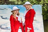 7th Heritage Polo Cup finals: Liberty Freedom Sandhurst Red Coats & Ascot Top Hats Pith Helmets worn by Camilla Lovegrove and Serena Lillington-Price at the Entrance of  Hurtwood Park Polo Club..
Hurtwood Park Polo Club,
Ewhurst Green,
Surrey,
United Kingdom,
on 05 August 2012 at 11:58, image #3