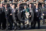 Remembrance Sunday 2012 Cenotaph March Past: Group E8 - The Fleet Air Arm Armourers Association, formed at the outbreak of WW2 to give firepower and air cover to the Atlantic convoys..
Whitehall, Cenotaph,
London SW1,

United Kingdom,
on 11 November 2012 at 11:39, image #93