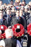 Nigel Dodds as Leader of the Democratic Unionist Party, and Ed Miliband as Leader of the Opposition. Behind George Osborne as Chancellor of the Exchequer and Toni Blair as former Prime Minister.