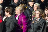 Remembrance Sunday Cenotaph March Past 2013: D1 - War Widows Association. The War Widows' Association exisits to improve the conditions of all War Widow/ers in the United Kingdom. The Association formed in 1971 following an article in a Sunday newspaper that highlighted the plight of Britain’s “forgotten women”. The Association gained charitable status in 1991 and continues to campaign against injustice..
Press stand opposite the Foreign Office building, Whitehall, London SW1,
London,
Greater London,
United Kingdom,
on 10 November 2013 at 11:38, image #26