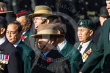 Remembrance Sunday at the Cenotaph in London 2014: Group D25 - Gurkha Brigade Association.
Press stand opposite the Foreign Office building, Whitehall, London SW1,
London,
Greater London,
United Kingdom,
on 09 November 2014 at 11:47, image #472