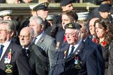 Remembrance Sunday at the Cenotaph in London 2014: Group E4 - Fleet Air Arm Armourers Association.
Press stand opposite the Foreign Office building, Whitehall, London SW1,
London,
Greater London,
United Kingdom,
on 09 November 2014 at 11:50, image #620