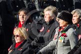 Remembrance Sunday at the Cenotaph in London 2014: Group E24 - Queen Alexandra's Royal Naval Nursing Service.
Press stand opposite the Foreign Office building, Whitehall, London SW1,
London,
Greater London,
United Kingdom,
on 09 November 2014 at 11:52, image #751
