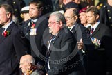 Remembrance Sunday at the Cenotaph in London 2014: ??? Please let me know which group this is! ???.
Press stand opposite the Foreign Office building, Whitehall, London SW1,
London,
Greater London,
United Kingdom,
on 09 November 2014 at 11:55, image #884