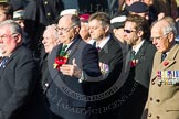 Remembrance Sunday at the Cenotaph in London 2014: ??? Please let me know which group this is! ???.
Press stand opposite the Foreign Office building, Whitehall, London SW1,
London,
Greater London,
United Kingdom,
on 09 November 2014 at 11:55, image #885