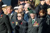 Remembrance Sunday at the Cenotaph in London 2014: Group F18 - Aden Veterans Association.
Press stand opposite the Foreign Office building, Whitehall, London SW1,
London,
Greater London,
United Kingdom,
on 09 November 2014 at 11:59, image #1085