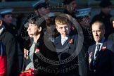 Remembrance Sunday at the Cenotaph in London 2014: Group M23 - Civilians Representing Families.
Press stand opposite the Foreign Office building, Whitehall, London SW1,
London,
Greater London,
United Kingdom,
on 09 November 2014 at 12:18, image #2167