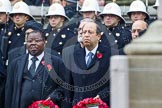 Remembrance Sunday at the Cenotaph in London 2014: The Deputy High Commissioner of Sierra Leone and the High Commissioner of Cyprus with their wreaths at the Cenotaph.
Press stand opposite the Foreign Office building, Whitehall, London SW1,
London,
Greater London,
United Kingdom,
on 09 November 2014 at 11:02, image #170