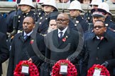 Remembrance Sunday at the Cenotaph in London 2014: The Acting High Commissioner of Kenya, the Deputy High Commissioner of Uganda, and the Acting High Commissioner of Trinidad and Tobago with their wreaths at the Cenotaph.
Press stand opposite the Foreign Office building, Whitehall, London SW1,
London,
Greater London,
United Kingdom,
on 09 November 2014 at 11:02, image #172