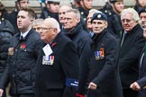 Remembrance Sunday at the Cenotaph 2015: Group E32, Fleet Air Arm Armourers Association.
Cenotaph, Whitehall, London SW1,
London,
Greater London,
United Kingdom,
on 08 November 2015 at 12:03, image #974