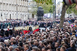 Remembrance Sunday at the Cenotaph 2015: The eastern side of Whitehall, with the three columns of veterans, waiting for the March Past, between the large numbers of specators lining both sides of the road. Image #69, 08 November 2015 10:45 Whitehall, London, UK