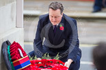 Remembrance Sunday at the Cenotaph 2015: The Prime Minister, David Cameron, laying his wreath at the Cenotaph. Image #206, 08 November 2015 11:06 Whitehall, London, UK