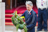 Remembrance Sunday at the Cenotaph 2015: The Secretary of State for Foreign and Commonwealth Affairs, Philip Hammond, about to lay his wreath at the Cenotaph. Image #223, 08 November 2015 11:08 Whitehall, London, UK