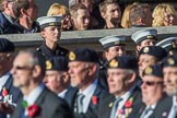 A tall Royal Navy lady overlooking HMS Glasgow Association  (Group E29, 29 members) during the Royal British Legion March Past on Remembrance Sunday at the Cenotaph, Whitehall, Westminster, London, 11 November 2018, 11:45.