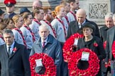 The Rt Hon Jeremy Corbyn MP, (Leader of the Labour Party and Leader of the Opposition)   and the Rt Hon Theresa May MP, Prime Minister, on behalf of the Government, leaving the Foreign and Commonwealth Office with their wreath during Remembrance Sunday Cenotaph Ceremony 2018 at Horse Guards Parade, Westminster, London, 11 November 2018, 10:55.